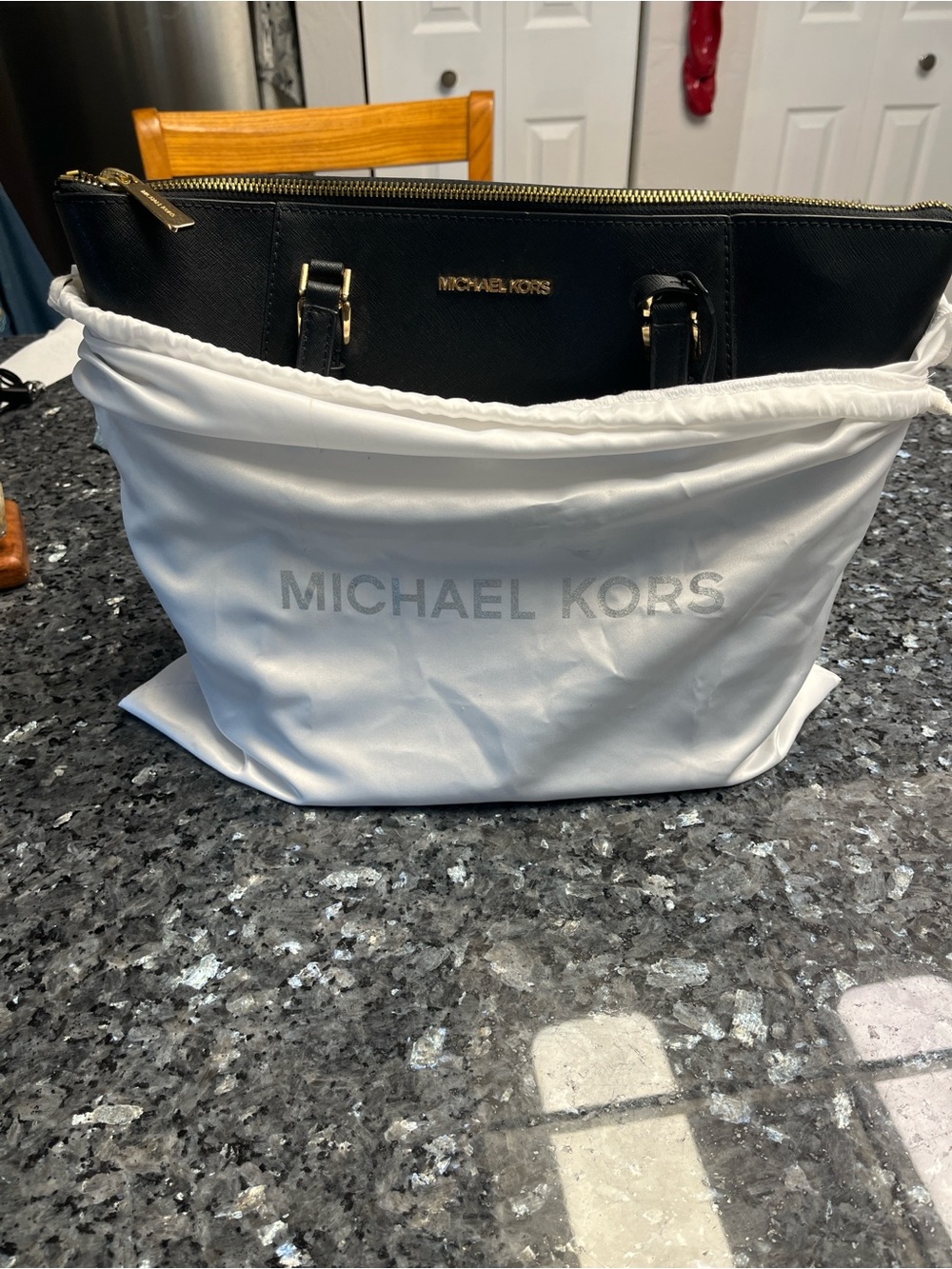 Michael Kors Black Leather Tote with Gold Accents
